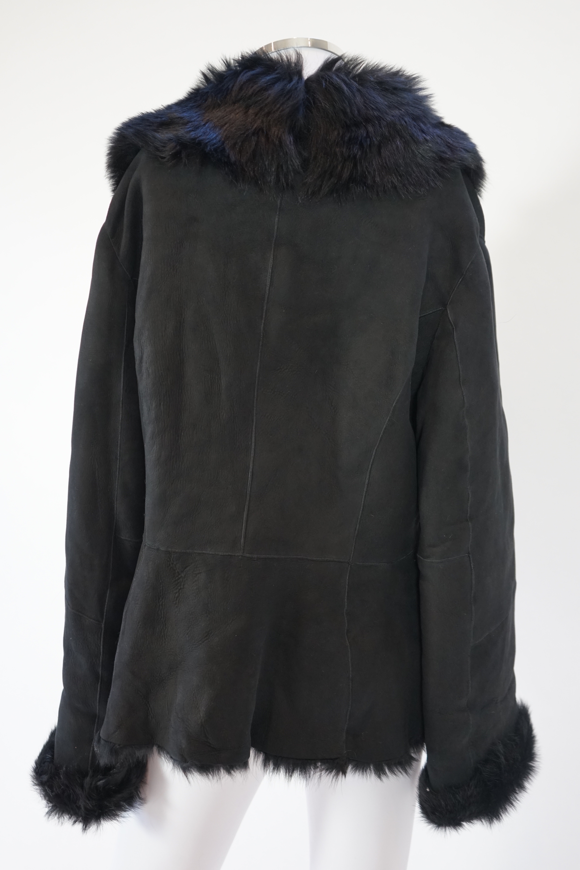 A lady's L K Bennett black shearling jacket, size Large